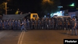 Armenia - Riot police block a street leading to a police station in Yerevan seized by opposition gunmen, 18Jul2016.