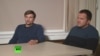 Dvojica muškaraca, kasnije identifikovani kao Anatolij Čepiga i Aleksandr Miškin, pojavljuju se na RT-u u septembru 2018. godine kako bi razgovarali o optužbama da su bili uključeni u trovanje Novičokom u Britaniji.