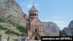 Armenia - Tourists at the 13-14th century Noravank monastery in Vayots Dzor province, August 20, 2016.