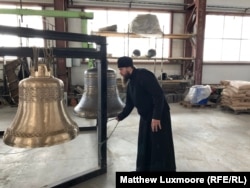 Father Roman Ogryzkov, director of the bell center at Moscow's Danilov Monastery, at the Anisimov bell foundry in Voronezh to test bells destined for the Armed Forces Cathedral