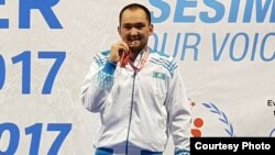 Казахстанский борец Асылжан Тажиев, призер Сурдлимпиады в Турции.