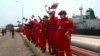 Venezuelan oil workers take part in the official welcoming of the arrival of the Iranian oil tanker Fortune in Puerto Cabello, the port city that is home to Venezuela's biggest oil refinery. 