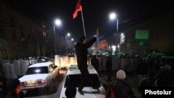 Armenia -- Protesters clash with riot police near the Russian consulate in Gyumri, 15 January 2015.