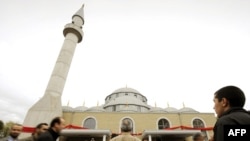 Some of the country's 4 million Muslims arrive for prayers at the Merkez Mosque in Duisburg, Germany (file photo)