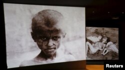 Historical photographs of mass killings of Armenians in the Ottoman Empire during World War I are displayed at the Tsitsernakaberd Armenian Genocide Memorial Museum in Yerevan.