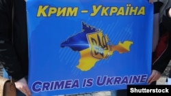 Акция солидарности с крымчанами, участники которой выступили в поддержку украинских политзаключенных в России и в оккупированном Крыму. Киев, 9 марта 2019 г.