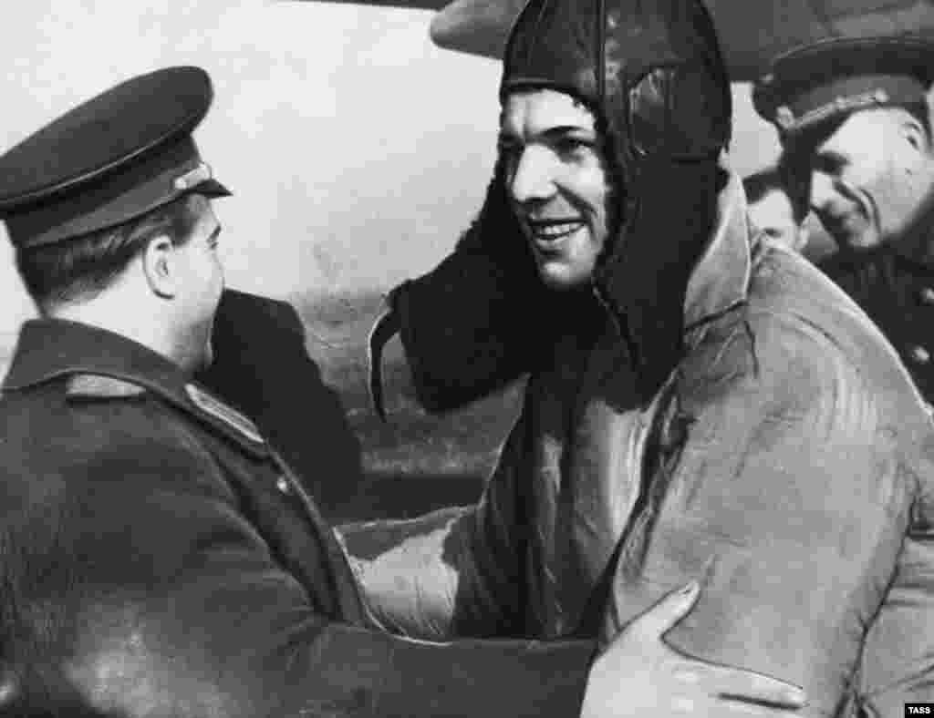 Gagarin is congratulated after the successful flight.