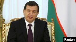 Kazkahstan -- Uzbek President Shavkat Mirziyaev attends a meeting with his Kazakh counterpart in Astana, March 23, 2017