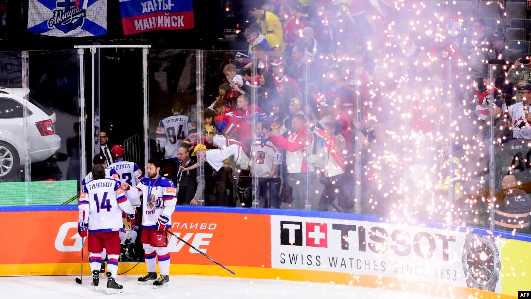 Russian players leave the ice after losing the gold-medal match against Canada on May 17.