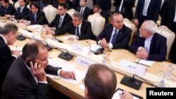 Xarici işlər nazirləri Sergei Lavrov, Mevlüt Çavuşoğlu və Məhəmməd Cavad Zərif Moskva görüşü zamanı