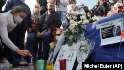 Париж, акция памяти убитого учителя