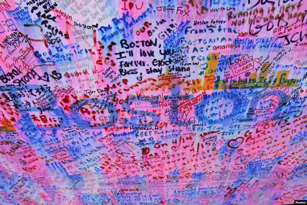 Messages left at a memorial for the victims of the Boston Marathon bombings.