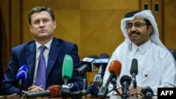 Russian Energy Minister Aleksandr Novak (left) and Mohammed bin Saleh al-Sada, president of OPEC (file photo)