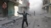 В пригородах Алеппо – через несколько минут после авианалета, 16 апреля 2014 г. 
