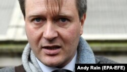 Richard Ratcliffe, the husband of jailed British-Iranian aid worker Nazanin Zaghari-Ratcliffe speaks to the press following a meeting with British Prime Boris Johnson at 10 Downing Street on January 23.