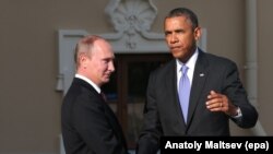 Russian President Vladimir Putin (left) and U.S. President Barack Obama exchange greetings prior to the first session of a G20 summit in St. Petersburg, Russia, on September 5.