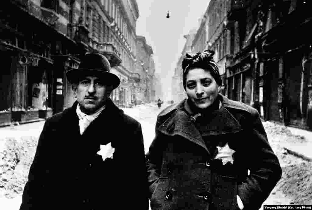 A couple in Budapest's Jewish ghetto soon after the Red Army drove Nazi forces out of the Hungarian capital. Khaldei recalled in a video interview that he greeted the pair in Hebrew before ripping the yellow Stars of David from their chests.