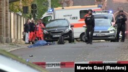 Police secure the area after a shooting in the eastern German city of Halle on October 9. 