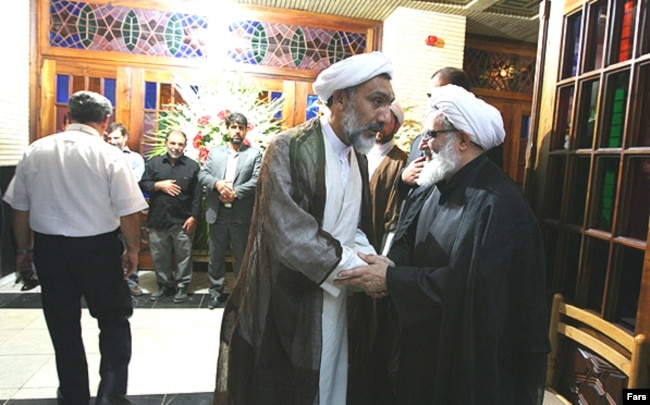 فلاحیان (راست) و مصطفی پورمحمدی، معاونش در وزارت اطلاعات که نقشی اصلی در اعدام‌های ۶۷ داشت
