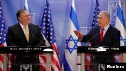 U.S. Secretary of State Mike Pompeo (left) and Israeli Prime Minister Benjamin Netanyahu deliver joint statements during their meeting in Jerusalem on March 20.