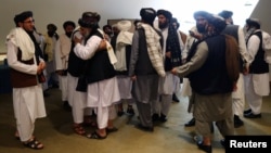 Members of the Taliban delegation in Doha, Qatar, ahead of the signing of the peace deal. 