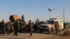 Afghan soldiers near the mosque where a suicide bomber blew himself up in the southeastern province of Khost.