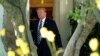 U.S. President Donald Trump walks out from the Oval Office of the White House in Washington, U.S., before his departure to Greer, South Carolina, October 16, 2017