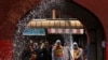 Pakistani workers spray disinfectants on a road in Peshawar, the provincial capital of Khyber Pakhtunkhwa, after authorities closed them to fight against the spread of the coronavirus on March 23.