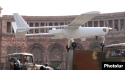 Armenia - An Armenian-made drone is driven through Yerevan's Republic Square during a military parade rehearsal, 19Sep2011.