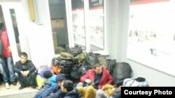Орус-казак чек арасындагы тажик мигранттары.