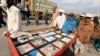 Relatives display pictures of people who have gone missing in restive province of Balochistan.