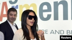 Armenia -- US television personality Kim Kardashian walks shortly after her arrival in Yerevan, April 8, 2015