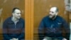 The former chief of the cybercrime department at Russia's FSB security service, Sergei Mikhailov (left), and Ruslan Stoyanov, a former employee of the cybersecurity firm Kaspersky Lab at their court hearing in Moscow on February 26. 