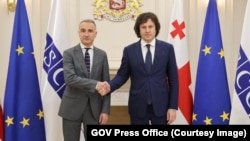 Пере Хуан Понс Сампьетро и Ираклий Кобахидзе