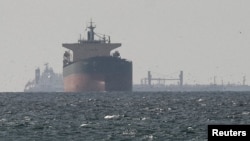 Cargo ships in the Persian Gulf near the Strait of Hormuz (file photo)