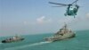 An Iranian naval drill off the Strait of Hormuz last year