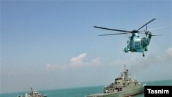 Iran begins navy drill off Strait of Hormuz as US newly wary