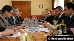 Armenia - Police chief Vladimir Gasparian (second from right) meets with U.S. Ambassador John Heffern, Yerevan, 24Sep2013.