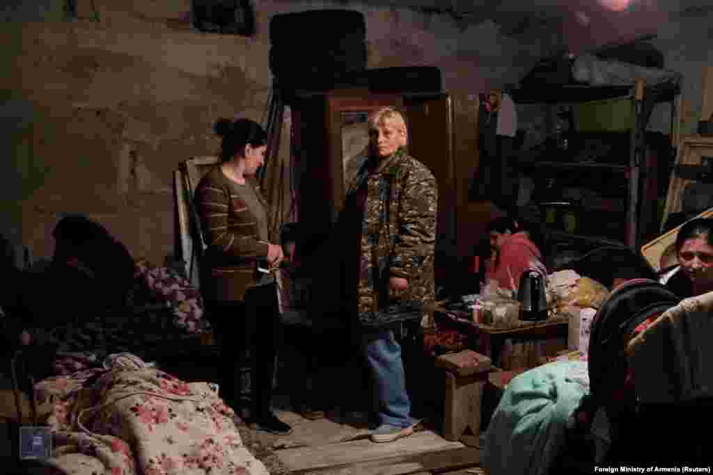 People gather in a bomb shelter in Stepanakert, the capital of the breakaway Nagorno-Karabakh region.