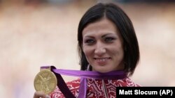 Natalya Antyukh, 41, won the gold at the London Olympics in August 2012, beating Lashinda Demus of the United States, who will be upgraded to the gold if the International Olympic Committee acts on the ruling by the Athletics Integrity Unit.