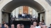 Armenia - People gather outside the Yerevan home of Russian-Armenian businessman Samvel Karapetian, June 17, 2025.