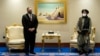 U.S. Secretary of State Mike Pompeo (left) meets with Mullah Abdul Ghani Baradar, head of the Taliban's peace negotiation team, amid talks between the Taliban and the Afghan government, in Doha on November 21, 2020.