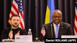 Ukraine's President Volodymyr Zelensky (left) and U.S. Defense Secretary Lloyd Austin at the opening of the Ukraine Defense Contact Group meeting at Germany's Ramstein Air Base on January 9