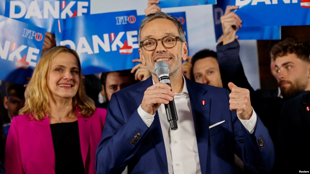Freedom Party leader Herbert Kickl talks to supporters in Vienna late on September 29, as vote projections showed his party winning Austria's general election.