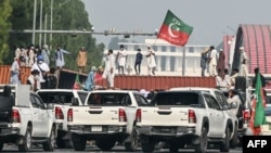 Supporters of former Prime Minister Imran Khan's PTI party protest in Islamabad on October 5.