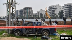 Izraelske bezbjednosne snage na mjestu napada u sjevernom Izraelu, Afula, 26. decembar 2025.