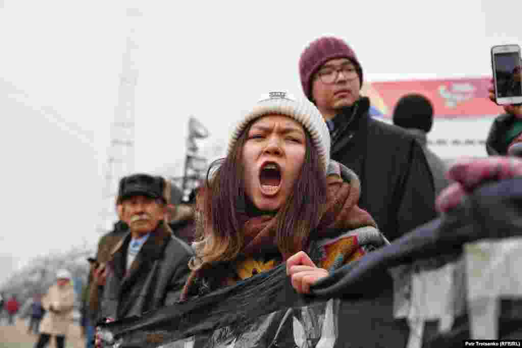 A young woman protests in Almaty.&nbsp;The rallies were called to mark Kazakhstan&#39;s Independence Day, as well as the anniversaries of the crackdowns in 1986 and 2011.