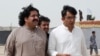 FILE: Lawmakers Ali Wazir (L) and Mohsin Dawar, leaders of the Pashtun Tahaffuz Movement (PTM).