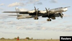 A Russian TU-95 Bear bomber making a landing (file photo)