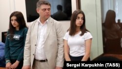 Maria (left) and Angelina (right) Khachaturyan attend a court hearing in Moscow on June 26, 2019.